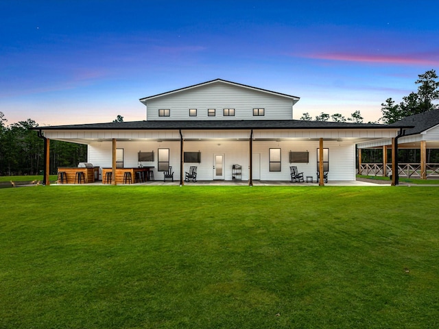 192 B Fm 1097, New Waverly, TX 77358 - back of property featuring a patio area and roof with shingles