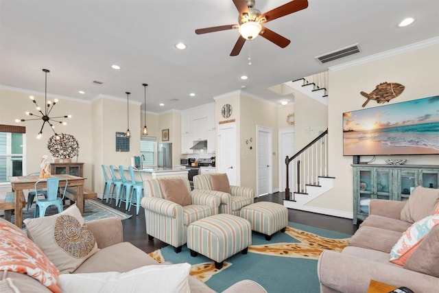 11446 Sea Butterfly, Galveston, TX 77554 - living room with dark wood-type flooring, stairs, recessed lighting, a ceiling fan, and crown molding