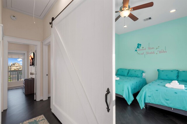 11446 Sea Butterfly, Galveston, TX 77554 - bedroom with dark wood finished floors, attic access, ceiling fan, and recessed lighting