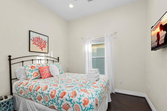 11446 Sea Butterfly, Galveston, TX 77554 - bedroom featuring wood finished floors, baseboards, and recessed lighting