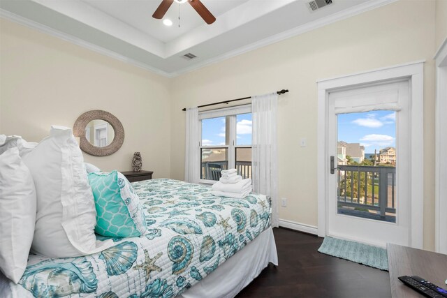 11446 Sea Butterfly, Galveston, TX 77554 - bedroom with access to outside, wood finished floors, ornamental molding, recessed lighting, and a raised ceiling