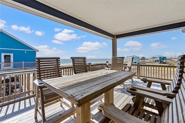 wooden terrace with a water view