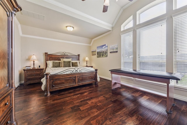 bedroom featuring vaulted ceiling, dark hardwood / wood-style floors, ceiling fan, and ornamental molding