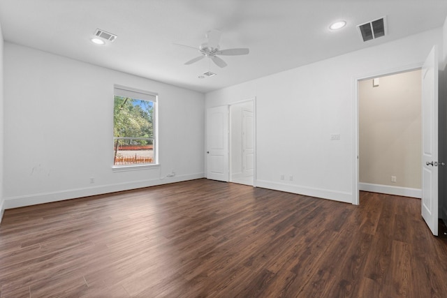 unfurnished bedroom with dark hardwood / wood-style floors and ceiling fan