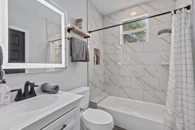 full bathroom with shower / bathtub combination with curtain, vanity, and toilet