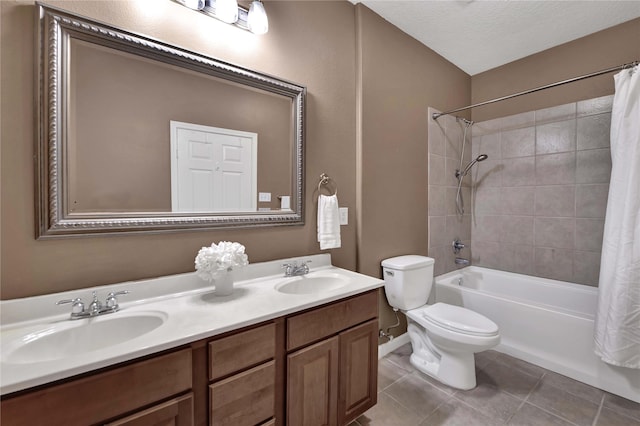 full bathroom with shower / tub combo, tile patterned flooring, vanity, a textured ceiling, and toilet