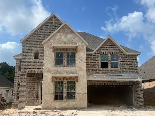 286 Peninsula Point Dr, Montgomery, TX 77356 - view of front of house featuring a garage, roof with shingles, and brick siding