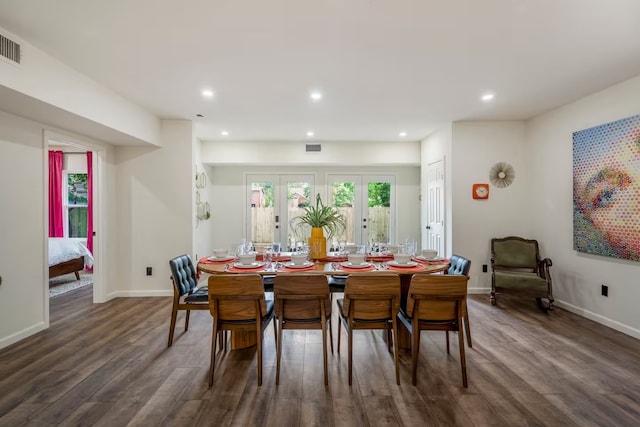 dining space with french doors and dark hardwood / wood-style floors