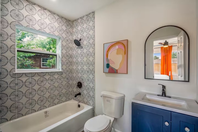 full bathroom featuring vanity, toilet, and tiled shower / bath combo