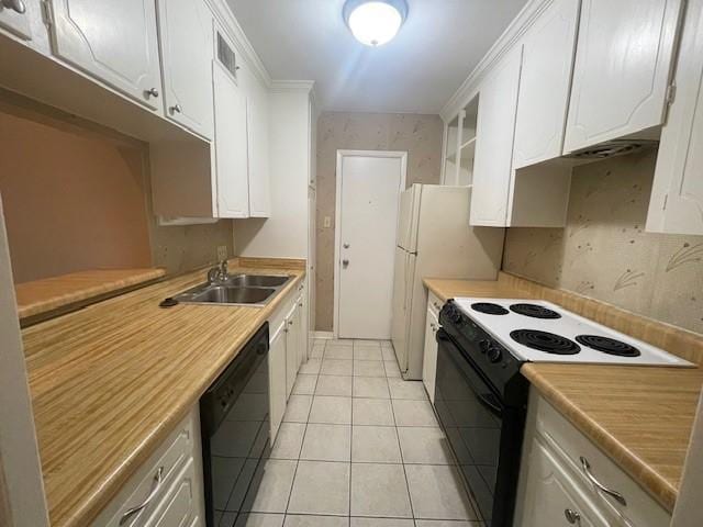 kitchen with light tile patterned floors, a sink, white cabinets, light countertops, and black appliances