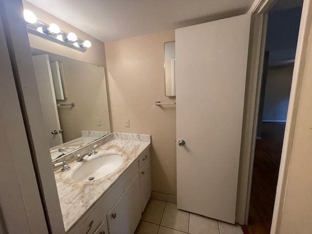 bathroom with vanity and tile patterned flooring