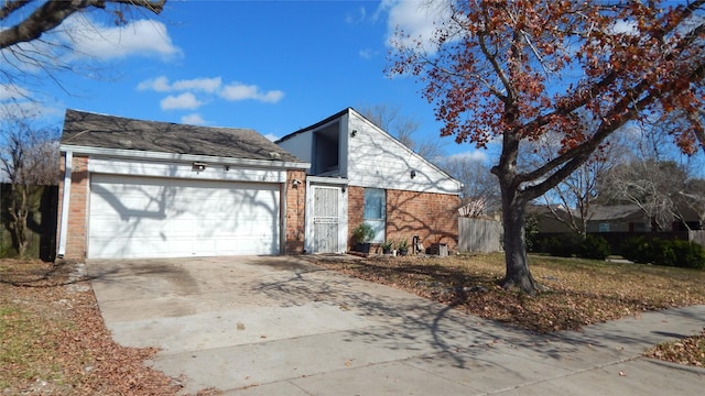 view of front of property with a garage