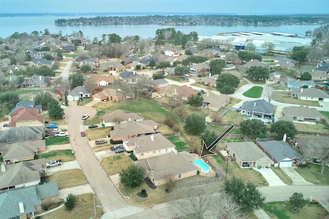 drone / aerial view featuring a water view