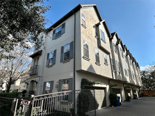 view of building exterior with a garage