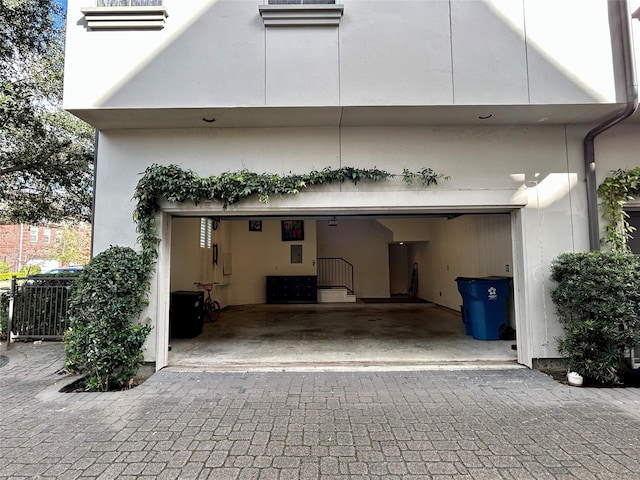 view of side of property with a garage