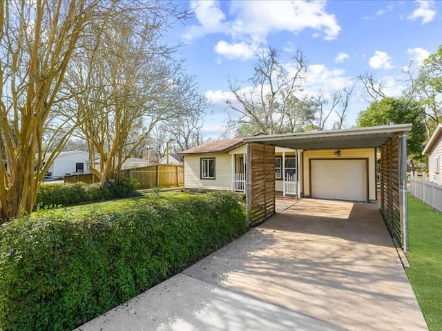 single story home with a garage and a front yard