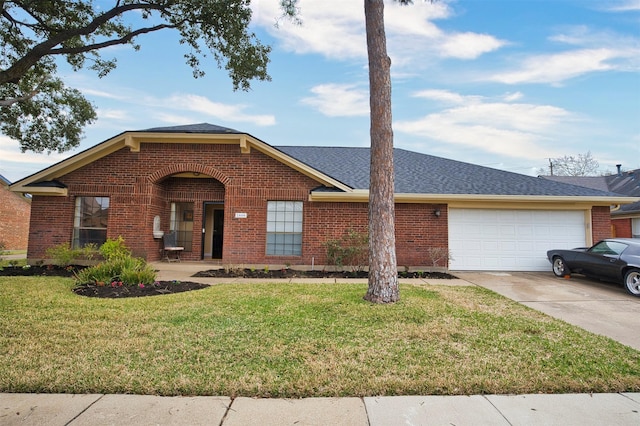 ranch-style house featuring a garage and a front yard