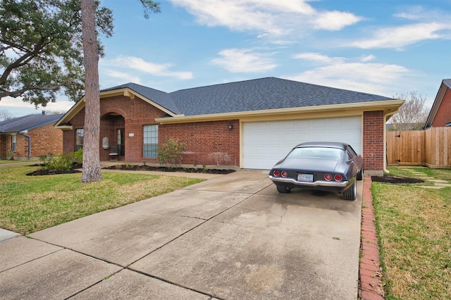 ranch-style house with a garage and a front lawn