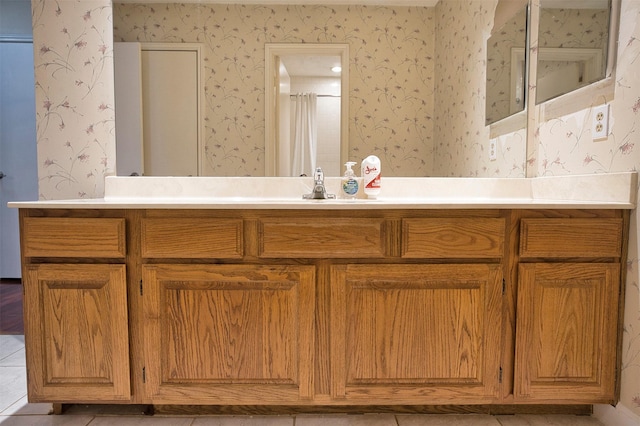 bathroom featuring vanity and walk in shower