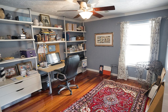 office space featuring ornamental molding, ceiling fan, a textured ceiling, and dark hardwood / wood-style flooring