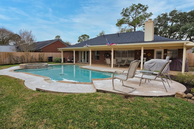 view of pool featuring an in ground hot tub, a yard, grilling area, and a patio