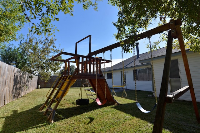 view of playground with a yard