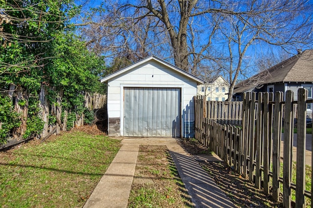 view of outdoor structure with a lawn