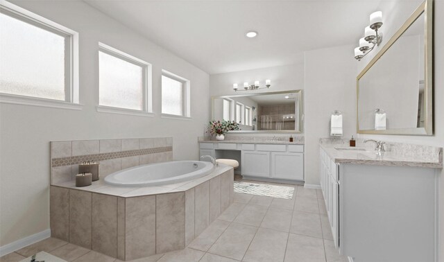 290 Peninsula Point Dr, Montgomery, TX 77356 - full bathroom with two vanities, a bath, and tile patterned floors