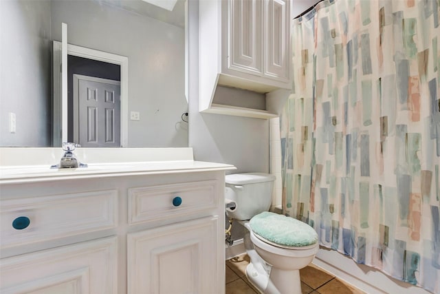 full bathroom featuring tile patterned flooring, vanity, shower / bath combination with curtain, and toilet