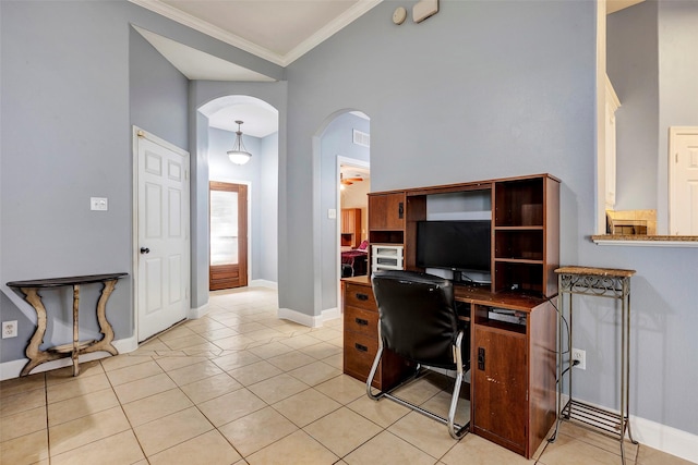 office featuring crown molding and light tile patterned flooring