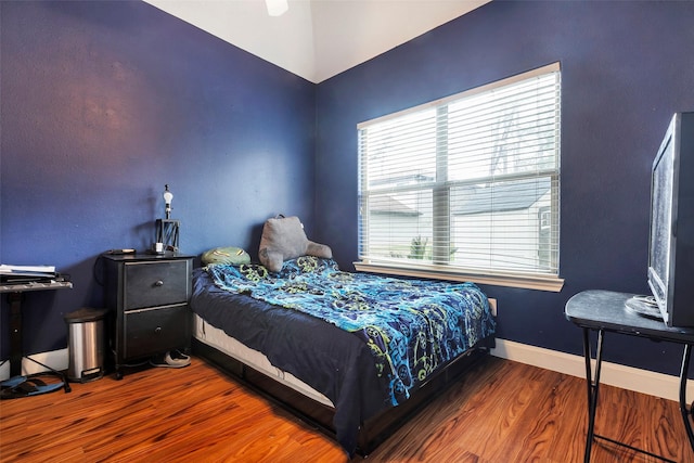 bedroom featuring hardwood / wood-style flooring