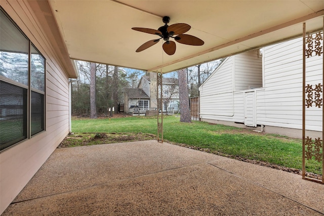 view of patio featuring ceiling fan