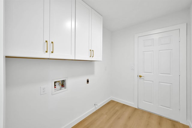 laundry area featuring cabinets, hookup for a washing machine, hookup for an electric dryer, and light wood-type flooring