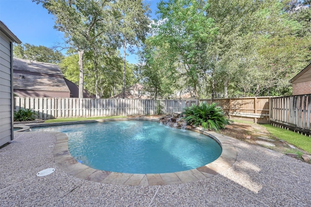 view of pool featuring pool water feature