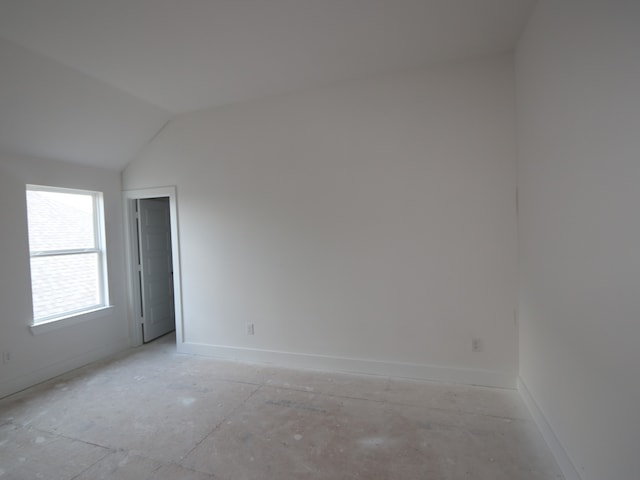 8315 Oceanmist Cove Dr, Cypress, TX 77433 - spare room featuring baseboards and lofted ceiling
