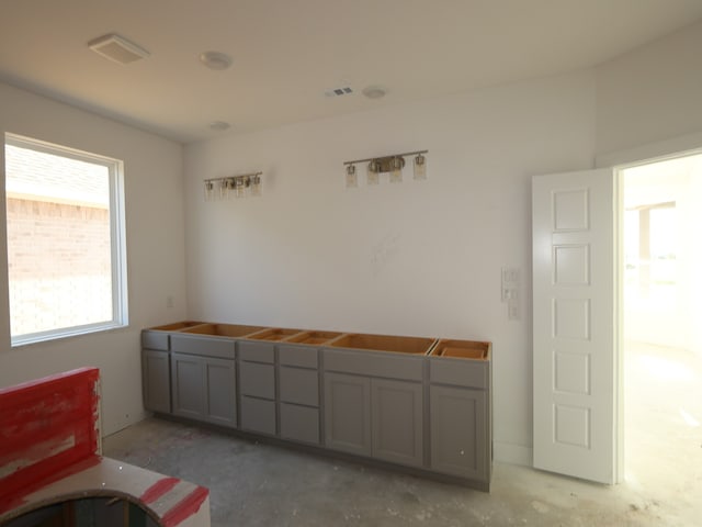 8315 Oceanmist Cove Dr, Cypress, TX 77433 - interior space with unfinished concrete floors
