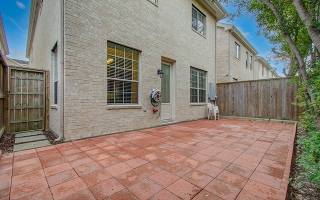 view of patio / terrace featuring fence