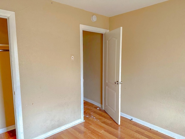 unfurnished bedroom with light hardwood / wood-style flooring