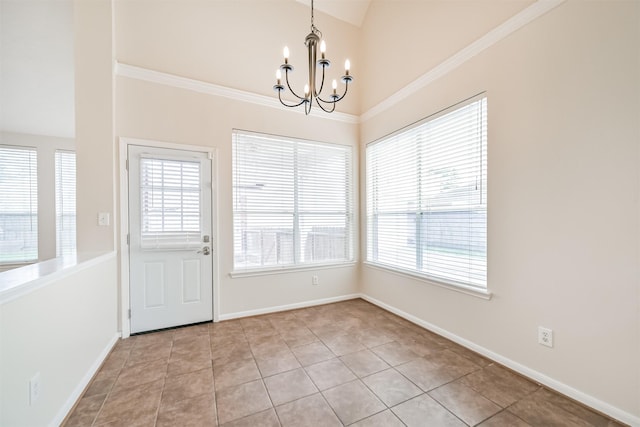 unfurnished dining area with light tile patterned flooring, vaulted ceiling, ornamental molding, and a notable chandelier