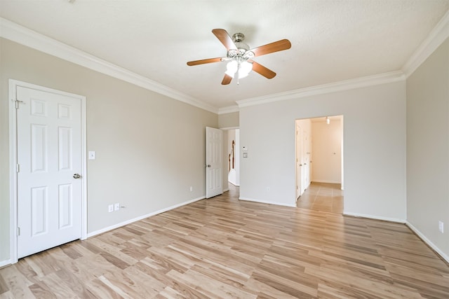 unfurnished bedroom with crown molding, light hardwood / wood-style flooring, and ceiling fan