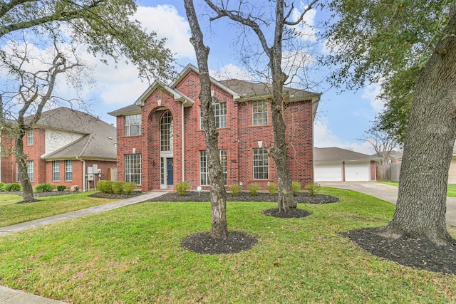 view of front of home featuring a garage and a front lawn