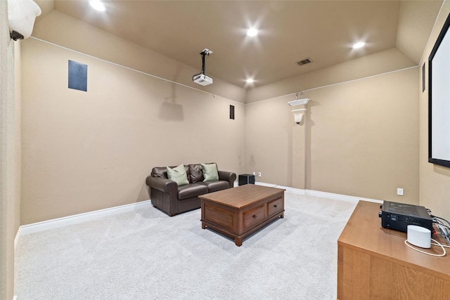 cinema with light carpet, baseboards, visible vents, and recessed lighting