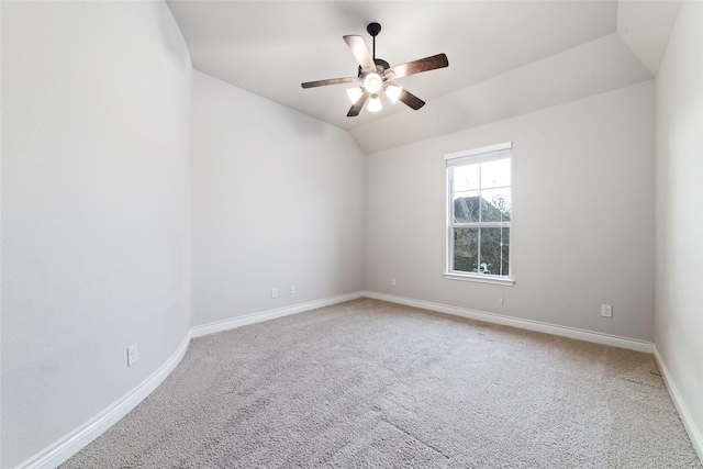 empty room featuring carpet floors, baseboards, and ceiling fan