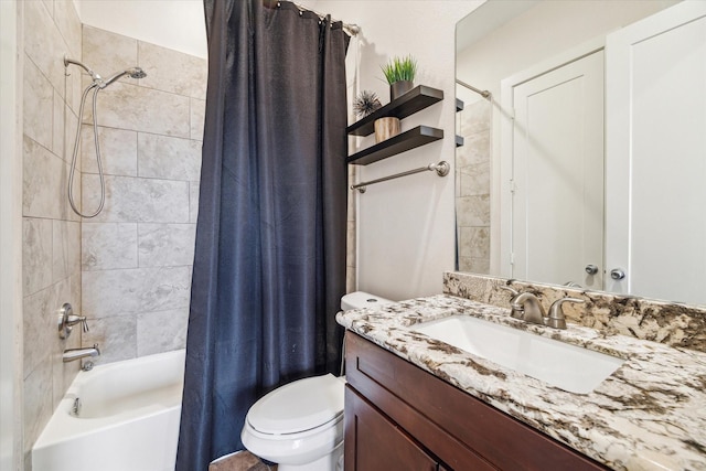 full bathroom with vanity, shower / bath combination with curtain, and toilet