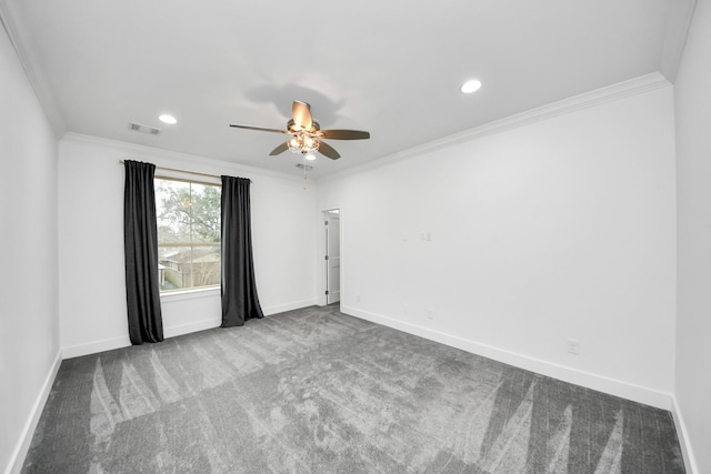 unfurnished room featuring baseboards, visible vents, light colored carpet, and ornamental molding