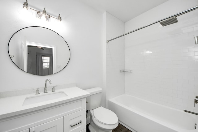 full bath featuring toilet, washtub / shower combination, and vanity