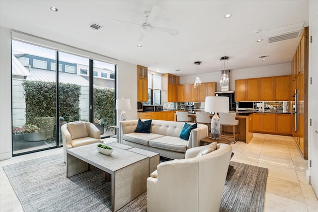 living room with ceiling fan