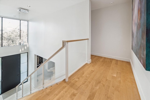 corridor featuring hardwood / wood-style floors