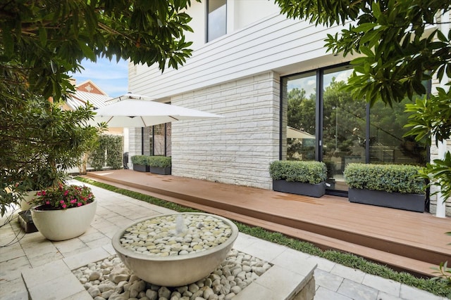 view of patio with a deck