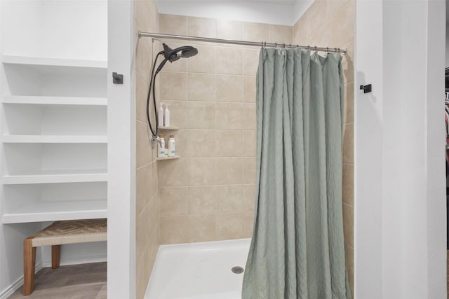 bathroom with curtained shower